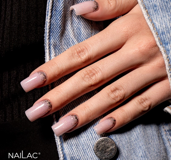 Kliknij na zdjęcie, aby je powiększyć NAILAC OPALX TOP HYBRID TOPCOAT BLUSH GOLD 7ML