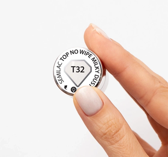 Kliknij na zdjęcie, aby je powiększyć Semilac x Margaret UV-Top mit Partikeln T32 Top No Wipe Milky Dust 7 ml