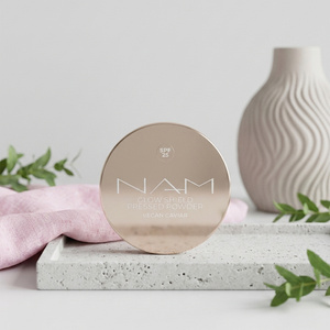 NAM Glow Shield gepresster schützender Puder SPF 25 10 g