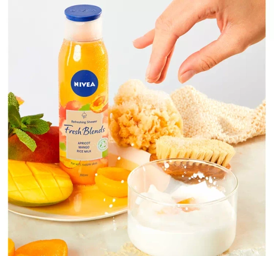 Kliknij na zdjęcie, aby je powiększyć NIVEA FRESH BLENDS ERFRISCHENDES DUSCHGEL APRIKOSE MANGO UND REISMILCH 300ML