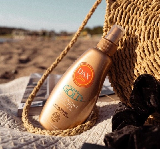 Kliknij na zdjęcie, aby je powiększyć DAX SUN BRÄUNUNGSBESCHLEUNIGER FÜR GESICHT UND KÖRPER TURBO GOLD 200ML