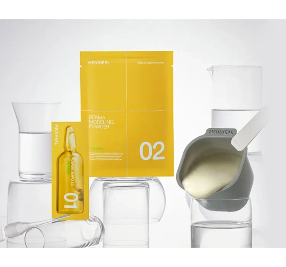 Kliknij na zdjęcie, aby je powiększyć Mediheal Derma Modeling Pack Vitamin Brightening Gesichtspflege-Set Algenmaske 28 g + Serum 2 ml