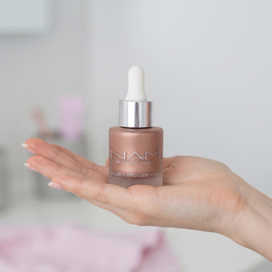 NAM Blonzing Drops – aufhellender flüssiger Bronzer-Rouge 03 15 ml