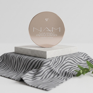 NAM Glow Shield gepresster schützender Puder SPF 25 10 g